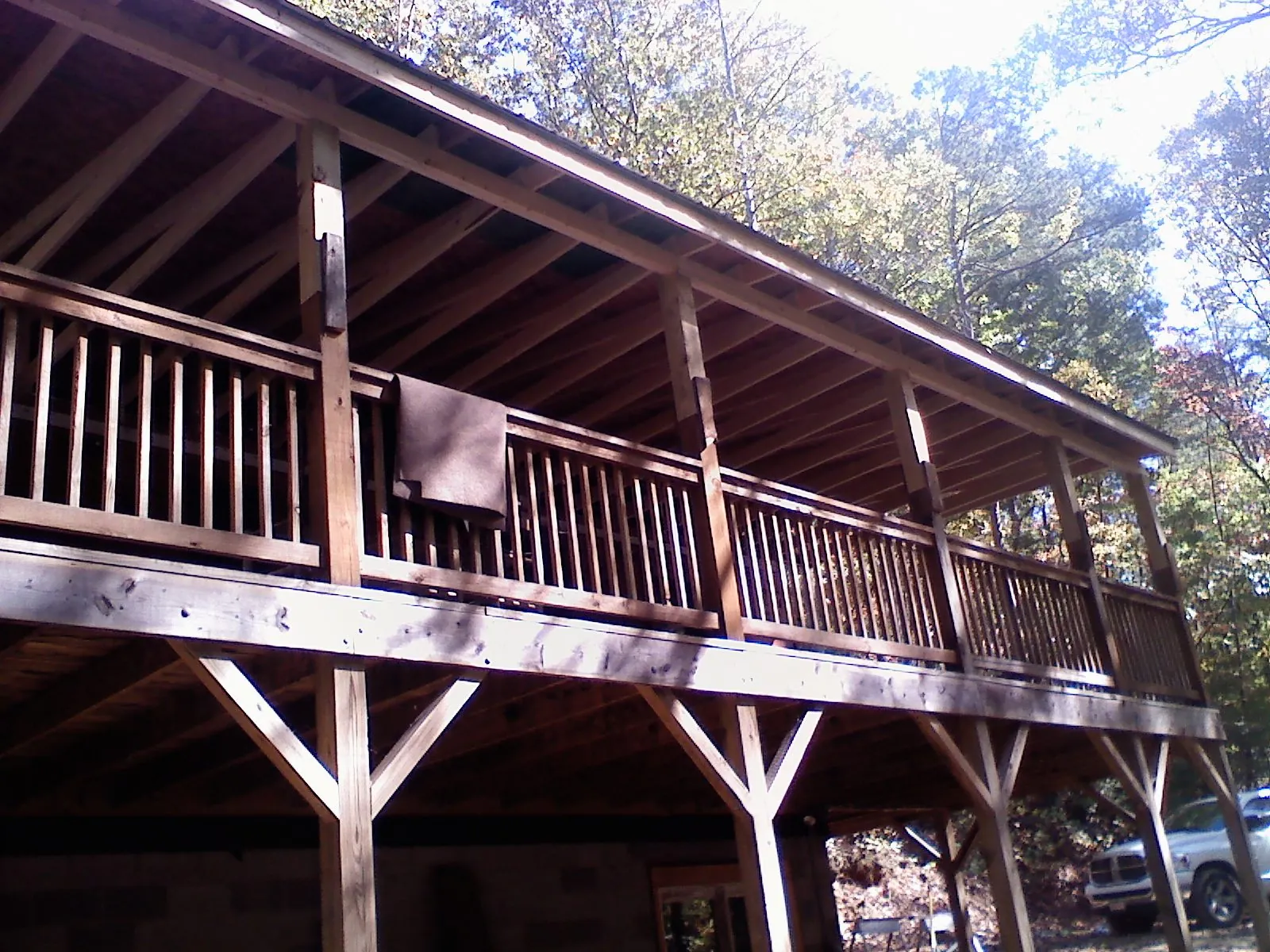 Timber framing under a new elevated porch and deck — Roof Leak Repair in Spangler by Roofing Brothers